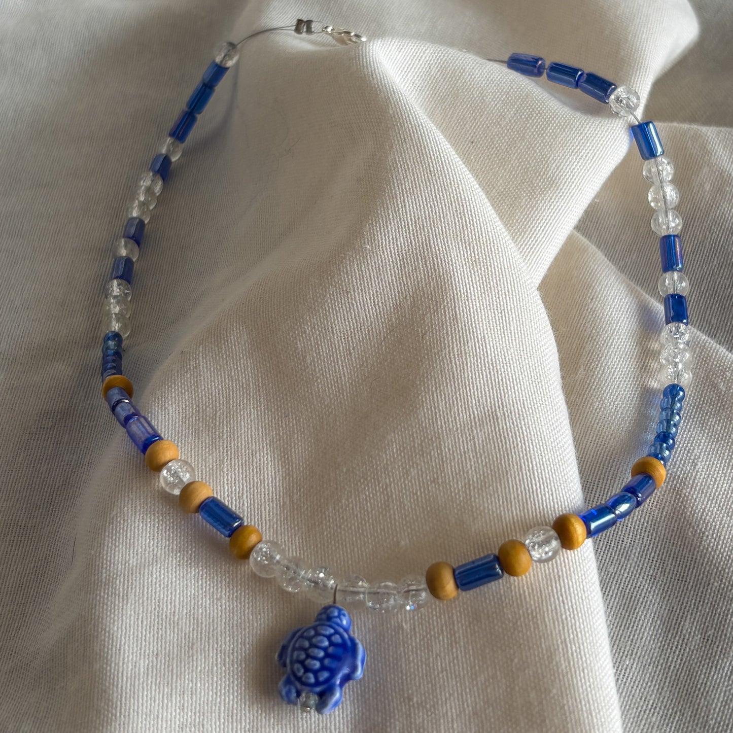 Blue Glass and Wood Turtle Necklace